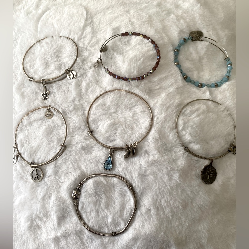 6 Alex and Ani Bracelets and 1 Pandora bracelet without charms